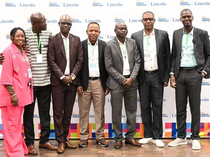 Africa Health Innovations portrait with media microphone at the forum